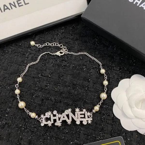 Polished Pearl Strand with Integrated Crystal Encrusted Logo - view 4