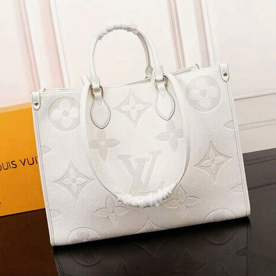 Clean-Finish Onthego MM Cream Monogram Bag - view 5