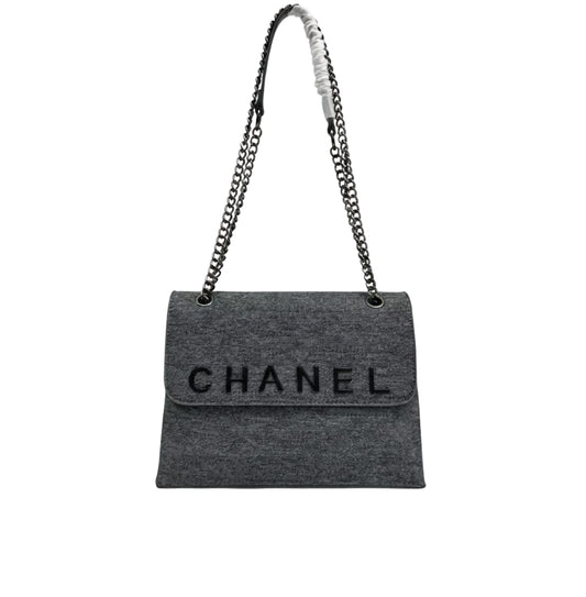 Statement Shoulder in a Felted Material with a Black Logo Bag