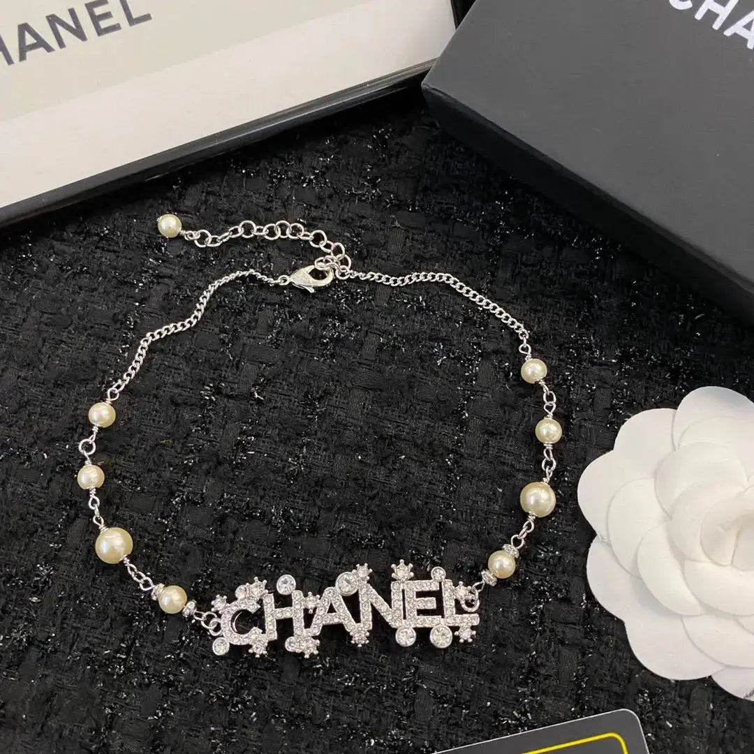 Polished Pearl Strand with Integrated Crystal Encrusted Logo - view 3